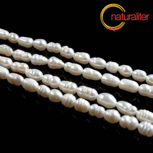 Říční perly rýžové bílé, 6x5mm, B, návlek 35cm Říční perly rýžové bílé, 6x5mm, B, návlek 35cm